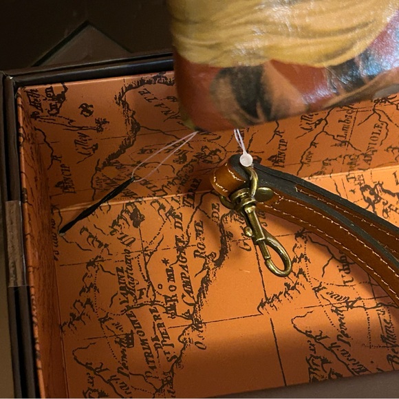 Brand New Patricia Nash fold over leather wristlet (still in & attached to box)